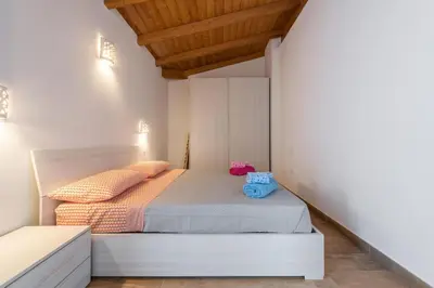 Letto o letti in una camera di Villa Sofia