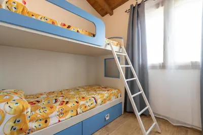 Letto o letti in una camera di Villa Sofia