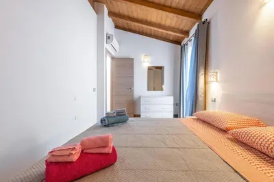Letto o letti in una camera di Villa Sofia