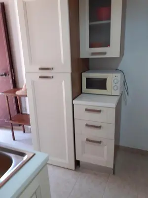 Cucina o angolo cottura di Casa spiaggia di Solanas 3