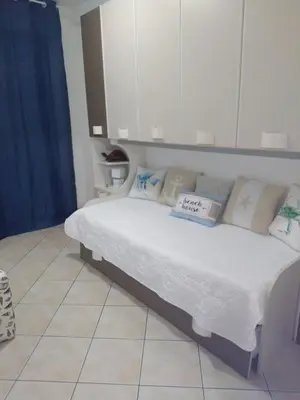 Letto o letti in una camera di Rami di Corallo Appartamento con Parcheggio Privato ----------