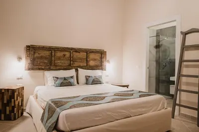Letto o letti in una camera di Moon's Tower suite&rooms