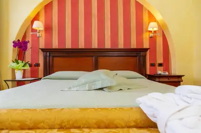 Letto o letti in una camera di Hotel Arbatasar