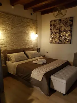 Letto o letti in una camera di Casa Virginia Antica Iglesias di Silvana
