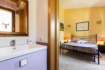 Letto o letti in una camera di Casa Marcella
