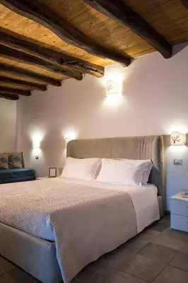 Letto o letti in una camera di Domu Elvira