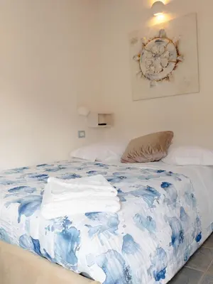 Letto o letti in una camera di Domu Elvira