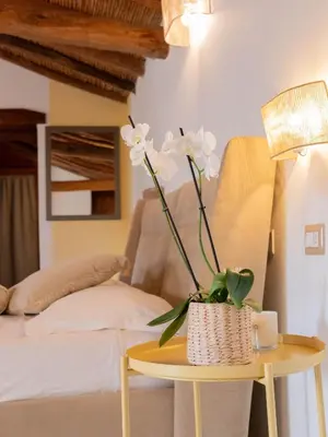 Letto o letti in una camera di Domu Elvira