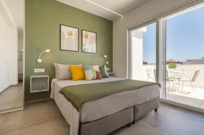 Letto o letti in una camera di Flamingo's way Cagliari