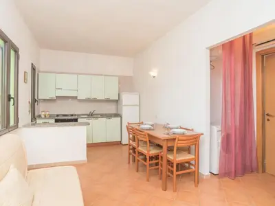 Cucina o angolo cottura di Apartment Stella con piscina comune - REI101 by Interhome