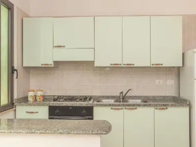 Cucina o angolo cottura di Apartment Stella con piscina comune - REI100 by Interhome