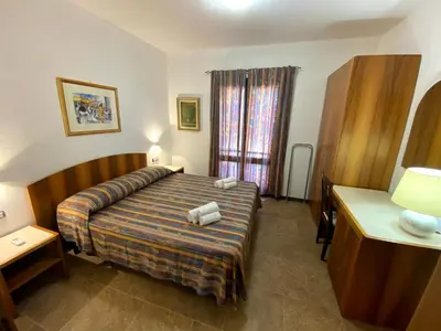 Letto o letti in una camera di Villa Silvana