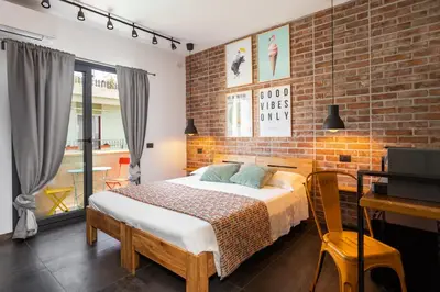 Letto o letti in una camera di Old Rooms