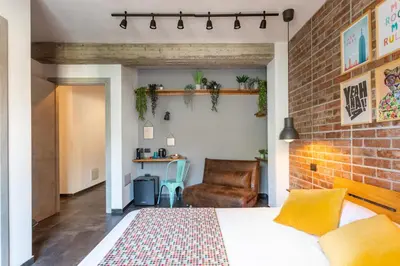 Letto o letti in una camera di Old Rooms