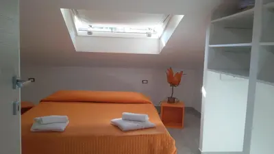 Letto o letti in una camera di Casa Lorenzo&Luca