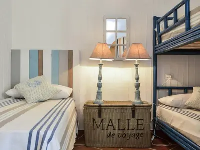 Letto o letti in una camera di Case Li Conchi Sardegna C