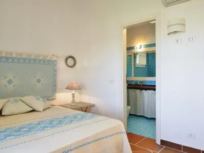 Letto o letti in una camera di Case Li Conchi Sardegna C