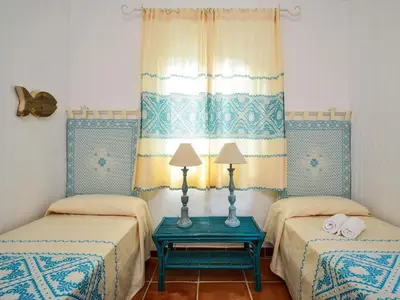 Letto o letti in una camera di Case Li Conchi F