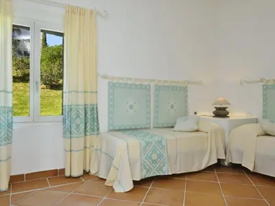 Letto o letti in una camera di Case Li Conchi Sardegna