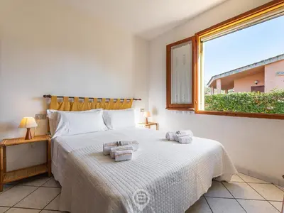 Letto o letti in una camera di Villa Maria Luisa