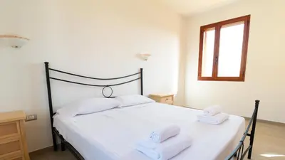 Letto o letti in una camera di Yellow House-Villetta a due passi dal mare