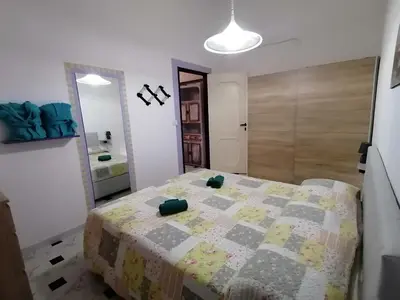 Letto o letti in una camera di Casa Carlo