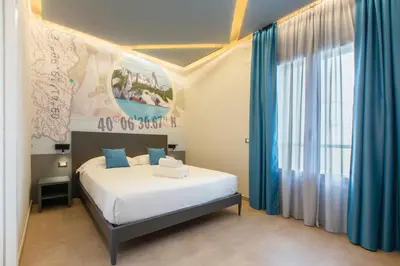 Letto o letti in una camera di ARKADIA Rooms & Apartments