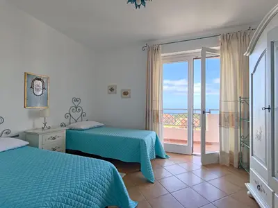 Letto o letti in una camera di Splendida vista sul mare