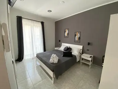 Letto o letti in una camera di AMARIS