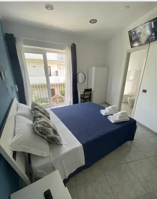 Letto o letti in una camera di AMARIS