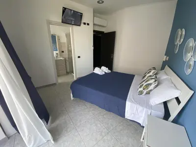 Letto o letti in una camera di AMARIS