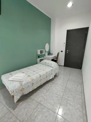 Letto o letti in una camera di AMARIS