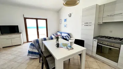 Cucina o angolo cottura di Attici con Terrazzo vista Mare