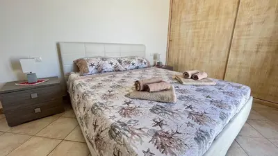 Letto o letti in una camera di Attici con Terrazzo vista Mare