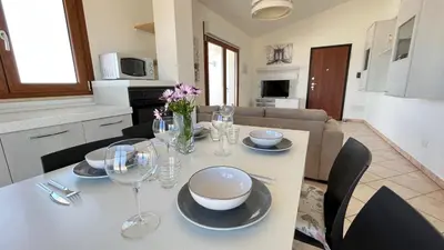 TV o dispositivi per l'intrattenimento presso Attici con Terrazzo vista Mare