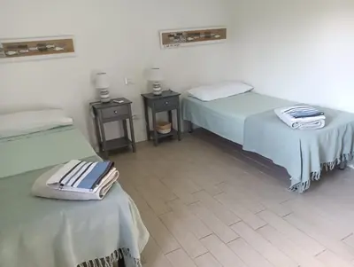 Letto o letti in una camera di Deliziosa Villa 150 metri dal mare