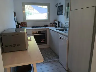 Cucina o angolo cottura di Deliziosa Villa 150 metri dal mare