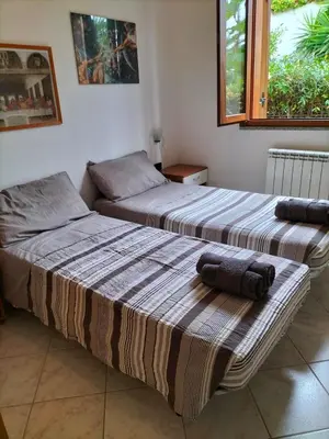 Letto o letti in una camera di Casa Birba