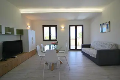 TV o dispositivi per l'intrattenimento presso Costa Rei Family Beach Apartments 300 m from the Beach