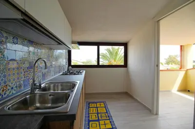 Cucina o angolo cottura di Costa Rei Family Beach Apartments 300 m from the Beach