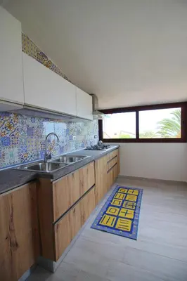 Cucina o angolo cottura di Costa Rei Family Beach Apartments 300 m from the Beach