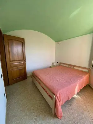 Letto o letti in una camera di Portu Hill Apartments