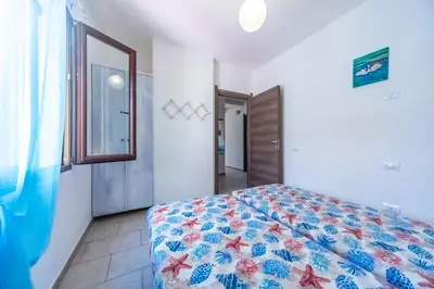 Letto o letti in una camera di Villa Tiziana&Alessia