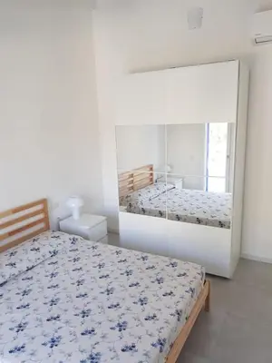 Letto o letti in una camera di Casa Tonia