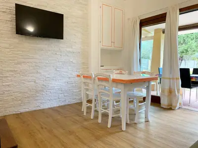 TV o dispositivi per l'intrattenimento presso Villa Giunco By La Via Del Mare Viaggi e Vacanze