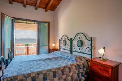 Letto o letti in una camera di L'Oasi del Cervo