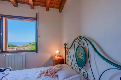 Letto o letti in una camera di L'Oasi del Cervo