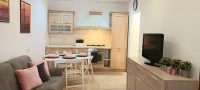 Cucina o angolo cottura di Holiday Home Sole e luna Wi-Fi free