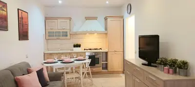 Cucina o angolo cottura di Holiday Home Sole e luna Wi-Fi free