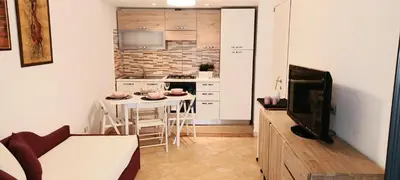 Cucina o angolo cottura di Holiday Home Sole e luna Wi-Fi free